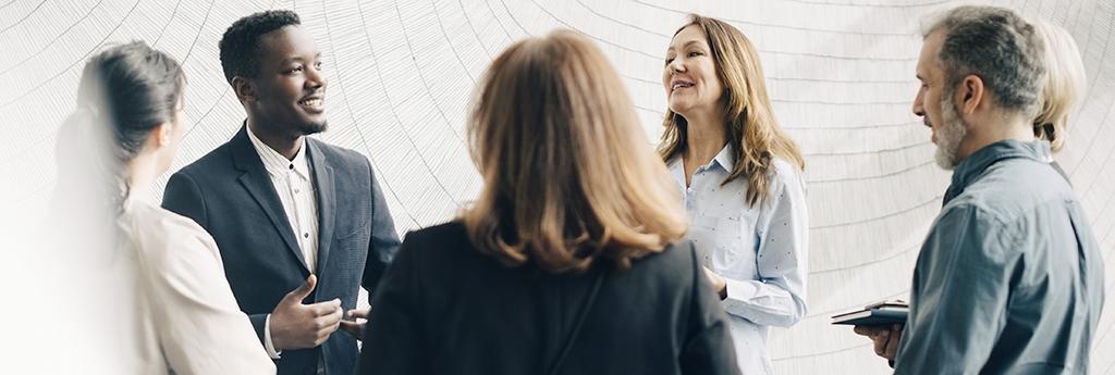 Overhead view of insurance professionals in meeting | CNA Insurance