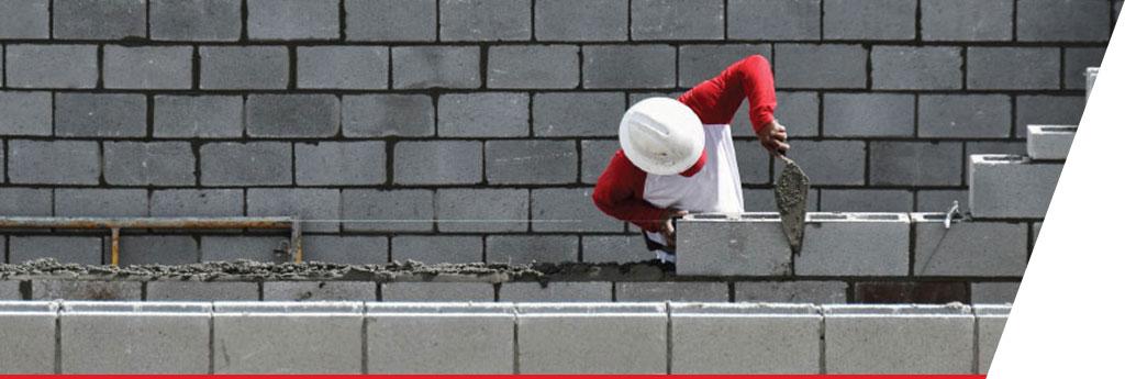 Bricklayer working on brick wall | CNA Insurance