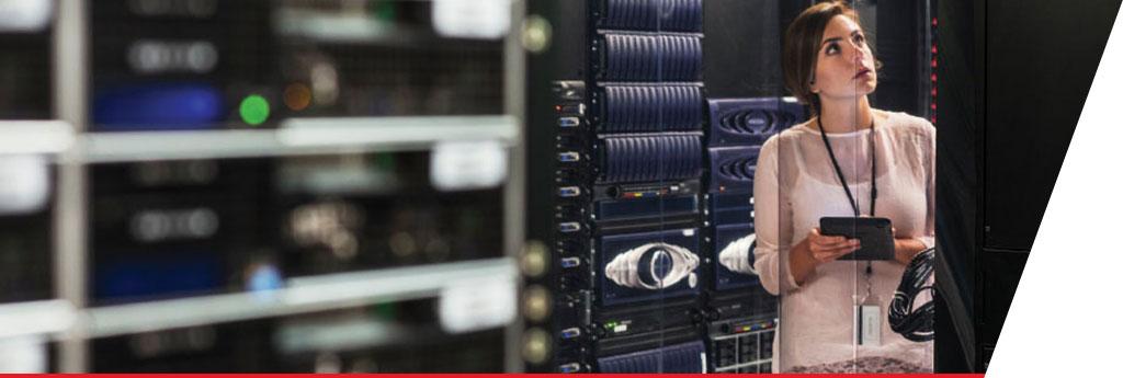 Woman working in technology server room | CNA Insurance