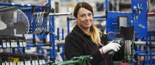 Female factory worker | CNA Insurance