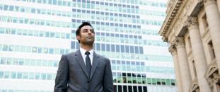 Business professional standing outside | CNA Insurance