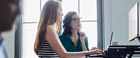 Women working at ergonomics office desk | CNA Insurance