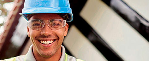 Male construction worker smiling | CNA Insurance